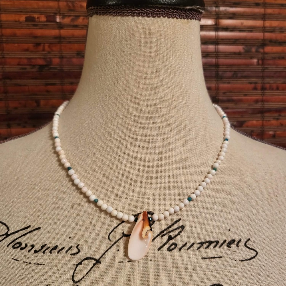 Elegant Queen Conch Shell Beaded Necklace With A Large Lily-Cut Strombus Shell.